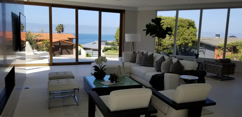 Bright vacation rental living room with ocean view